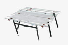 Load image into Gallery viewer, TSE 180 es un extensor basculante para sujeción de placas que ayuda a mejorar el trabajo del instalador, aumentando la seguridad y reduciendo la fatiga. Permite que un solo operario pueda hacer cualquier corte sin ayuda.